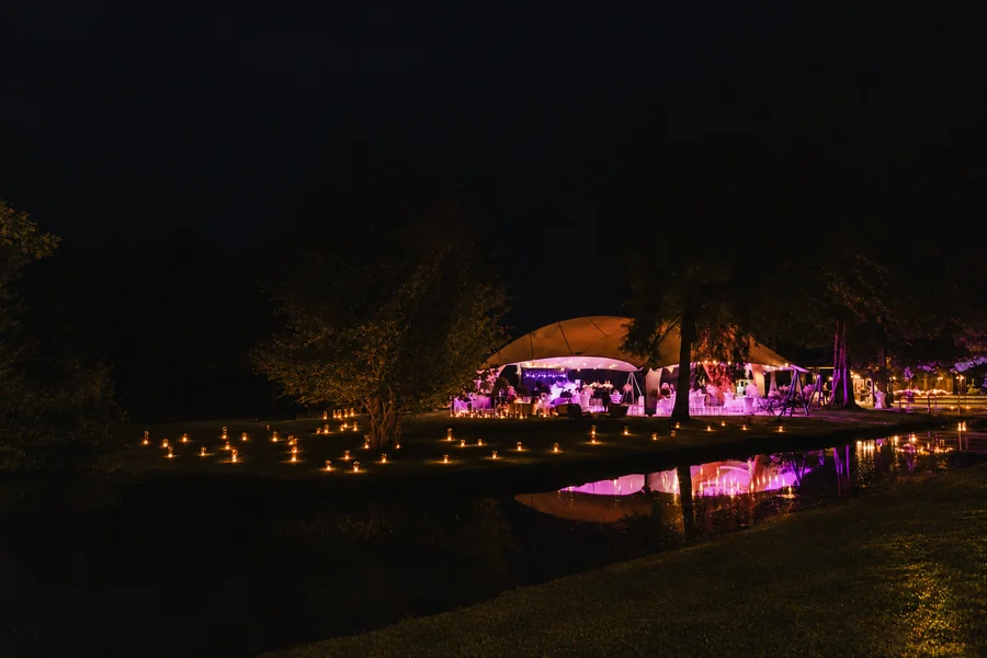 An evening event setup beside the water.